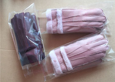China Los guantes más calientes de la zalea de la piel gruesa de las mujeres hechos a mano con la guarnición de la lana merina proveedor