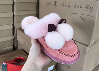 China Únicos deslizadores suaves rosas claros para el dormitorio, deslizadores de las lanas de las ovejas de casa para mujer proveedor