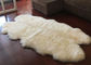 Blanco de marfil durable hecho a mano 120 *180cm de la manta australiana grande de la zalea de cuatro pieles proveedor