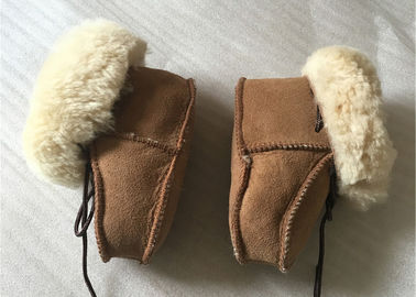 China Zapatos de bebé auténticos de la zalea, botas del invierno para el niño/el niño proveedor